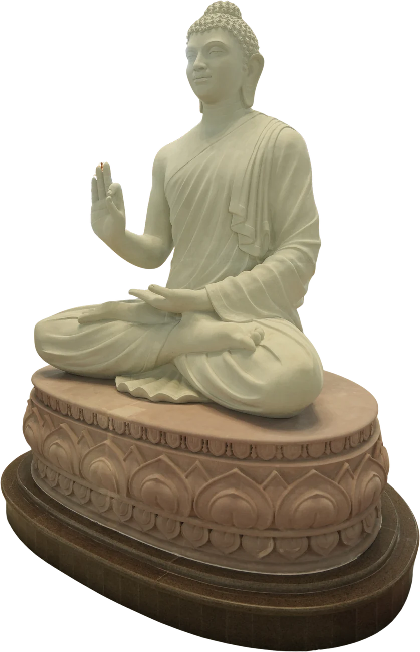 Statue of Gautama Buddha seated on a lotus pedestal, right hand raised
