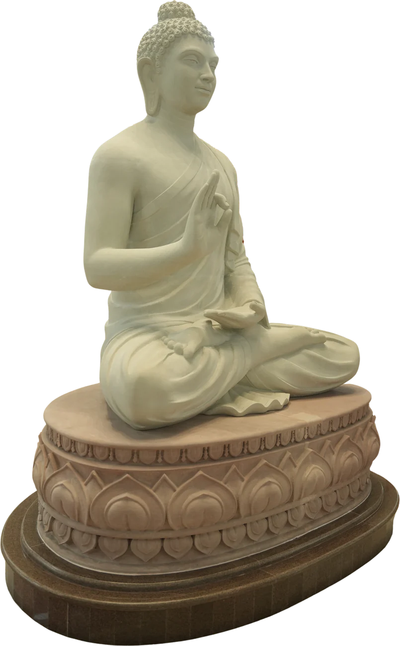 Statue of Gautama Buddha seated on a lotus pedestal, right hand raised